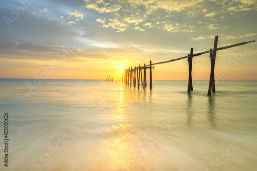 Landscape of Wooded bridge in the port between sunset