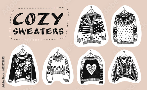 Cozy Doodle Sweaters. Vector set of cozy warm sweaters in different shapes. Hand draw collection isolated elements.