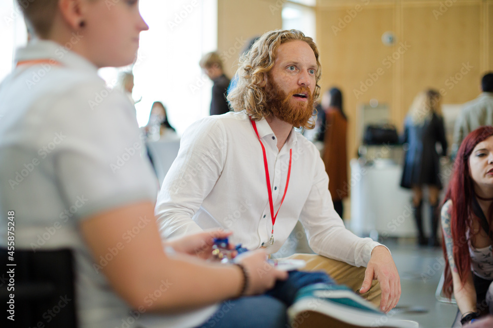 Obraz premium People talking during conference break