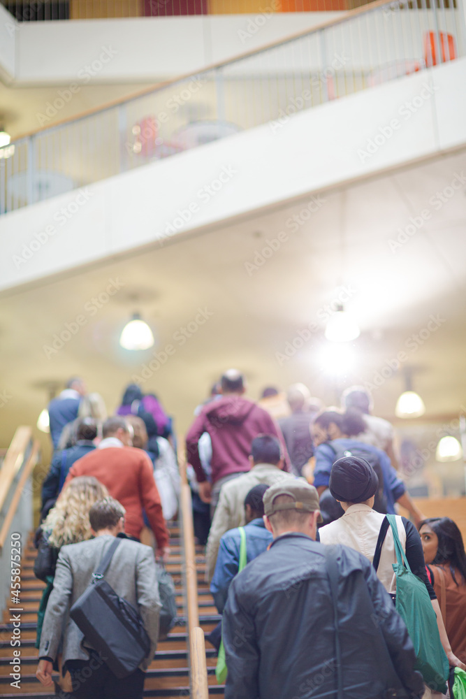 People walking upstairs People walking upstairs