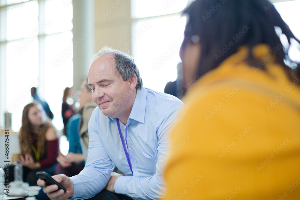 People talking during conference break People talking during conference break