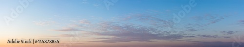 Photography Blue sky with clouds at sunset, large panoramic shot.
