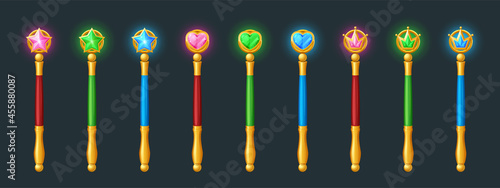 Magic wands, golden sticks with crystals in shape of star, heart and crown.. Vector cartoon set of wizard rods for magical tricks and spell, princess scepter isolated on dark background