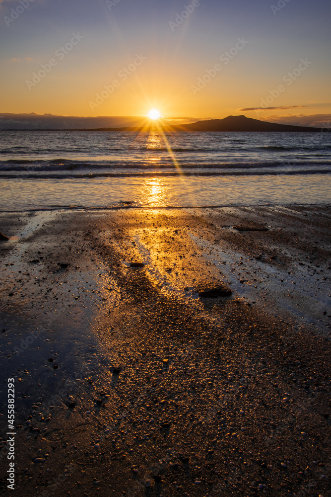 Beautiful sunrise over Takapuna beach in New Zealand