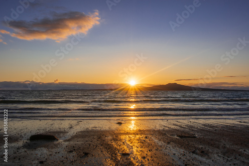 Beautiful sunrise over Takapuna beach in New Zealand