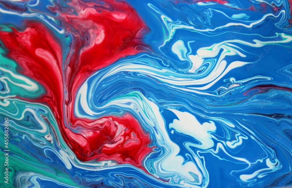 Green-red-blue abstract marble background. The lines and waves of paint create an interesting structure. Background for web design, fabric, design, notebook cover.