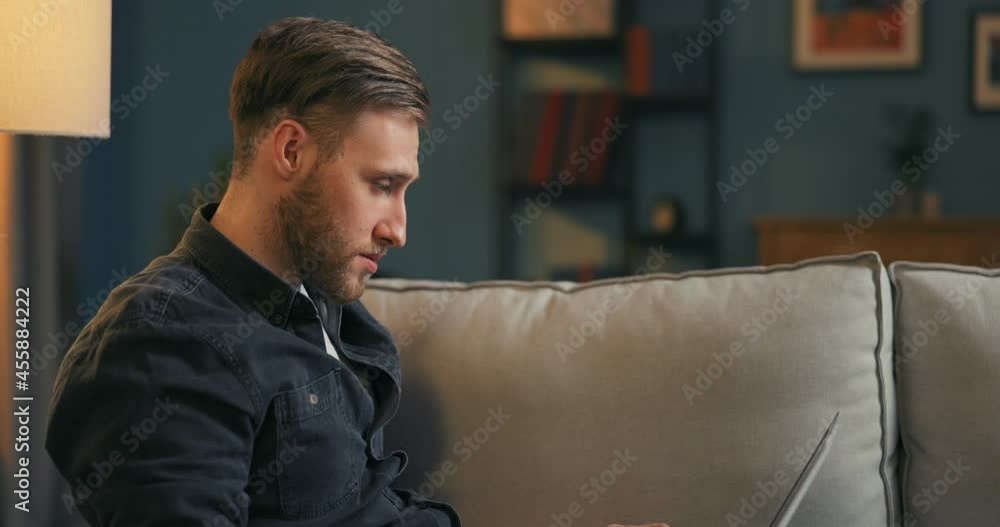 Focused man writes college paper, papers for work, rasports, social media post on laptop, forgets what he was supposed to write, ponders, remembers raises finger up , I already know Focused man writes college paper, papers for work, rasports, social media post on laptop, forgets what he was supposed to write, ponders, remembers raises finger up , I already know