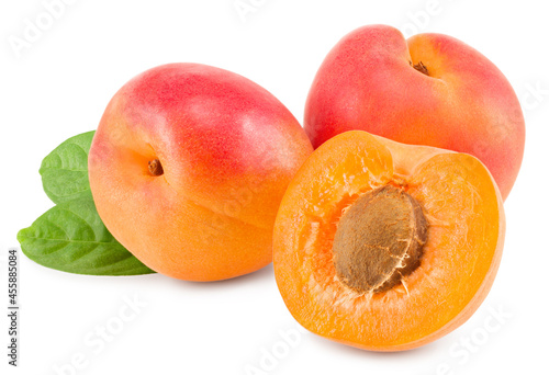apricot fruits with slices and green leaf isolated on white background. clipping path