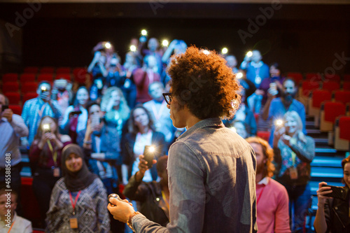 Male speaker talking to audience