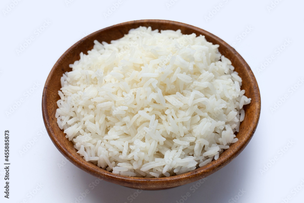 Wooden bowl of rice on white background. Wooden bowl of rice on white background.