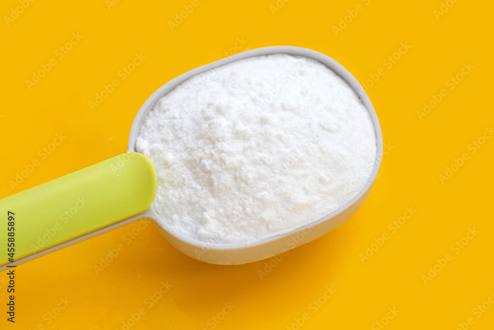Baking soda on yellow background. Baking soda on yellow background.