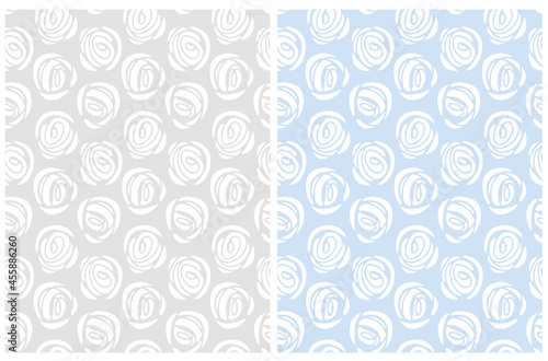 Abstract Geometric Seamless Vector Patterns. White Round Shape Scribbles Isolated on a Light Gray and Pastel Blue Background.Irregular Hand Drawn Print with Abstract Roses tideal for Fabric, Textile. 