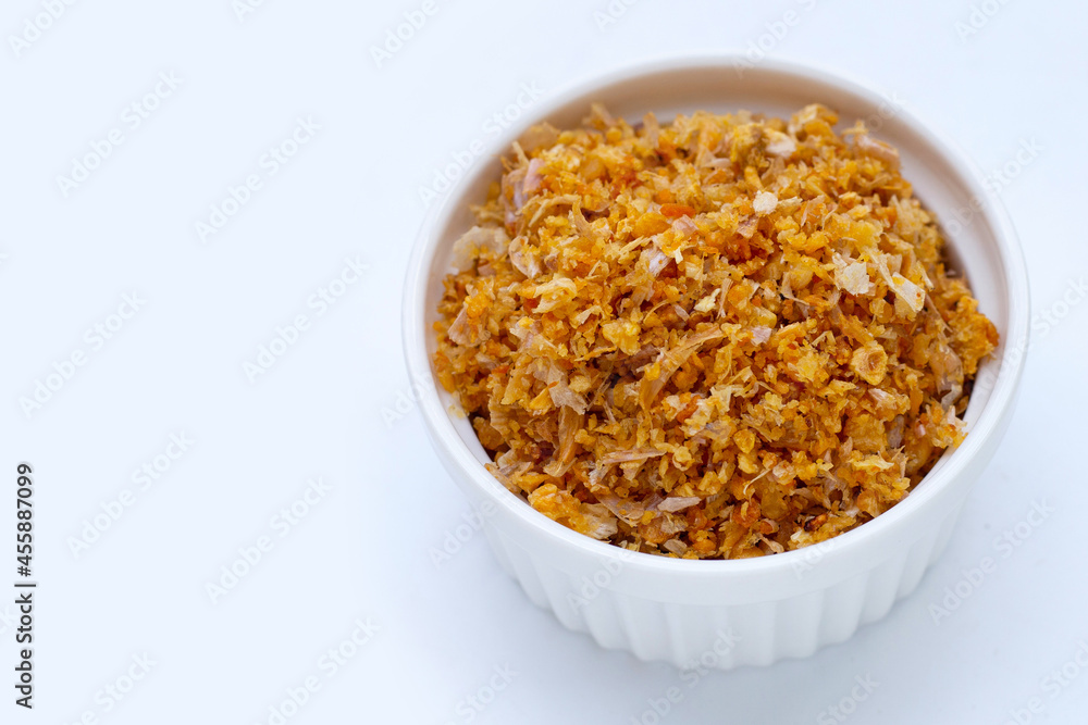 Fried chopped garlic on white background. Fried chopped garlic on white background.