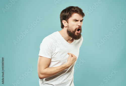 emotional man in a white t-shirt expressive look discontent Lifestyle