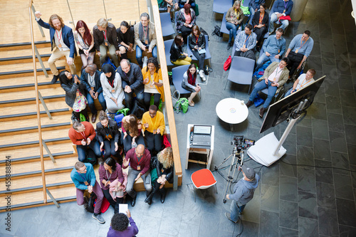 High angle view of people attending conference