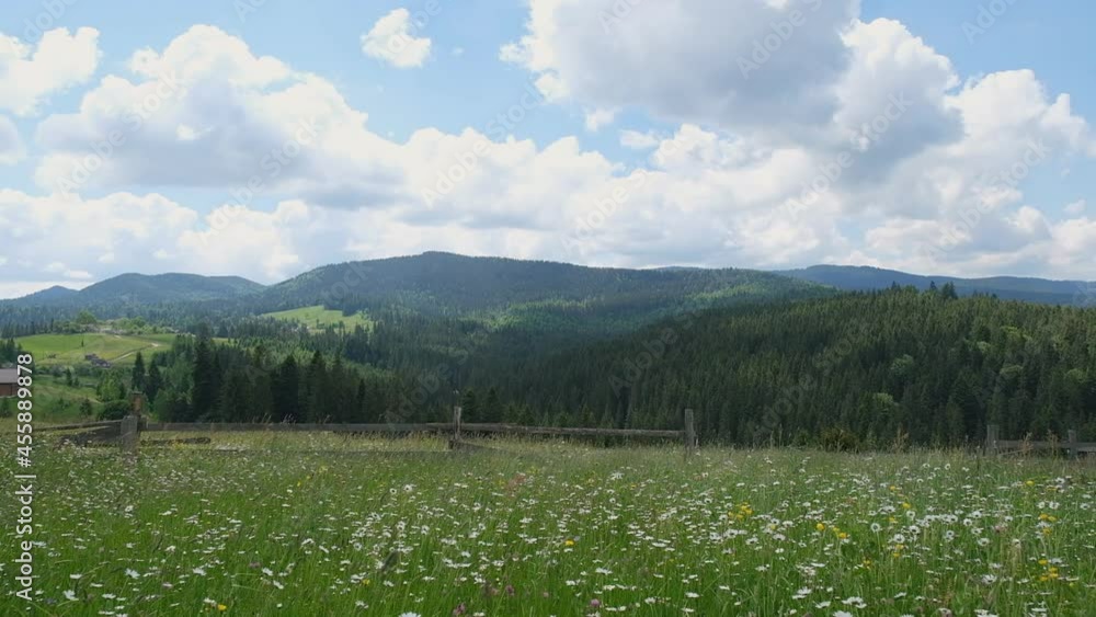 Evening landscape in the mountains. Alpine village view from the mountain. Summer mountain landscape in the Carpathians. Evening landscape in the mountains. Alpine village view from the mountain. Summer mountain landscape in the Carpathians.