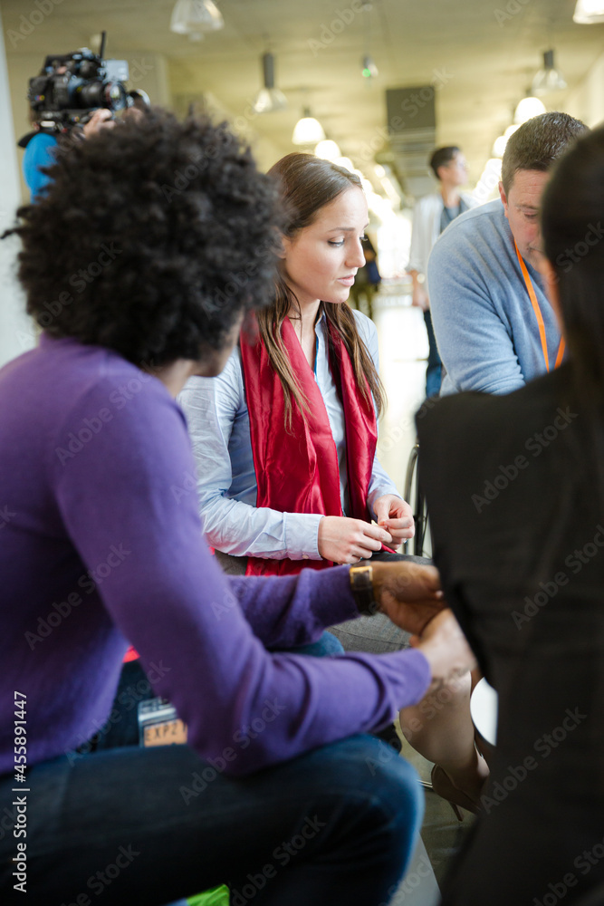 People talking during conference break People talking during conference break