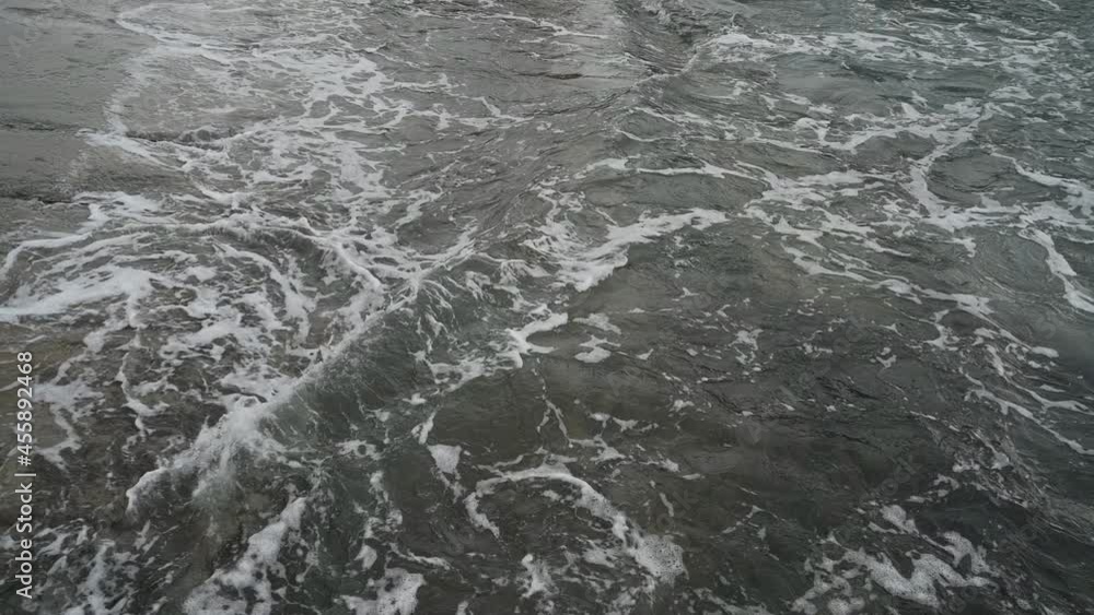 Waves at the seashore or pier in slow motion. Waves at the seashore or pier in slow motion.