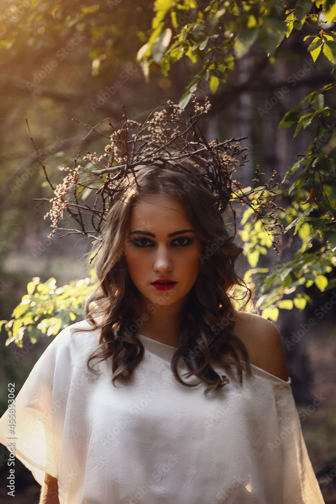 Beautiful mystery gothic woman in long white dress in autumn forest. Beautiful mystery gothic woman in long white dress in autumn forest.