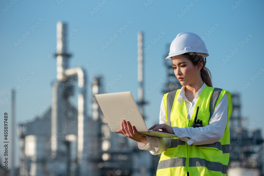 Engineer inspecting in industrial oil refinery. Industry 4.0 concept. Background blurred concept. Engineer inspecting in industrial oil refinery. Industry 4.0 concept. Background blurred concept.