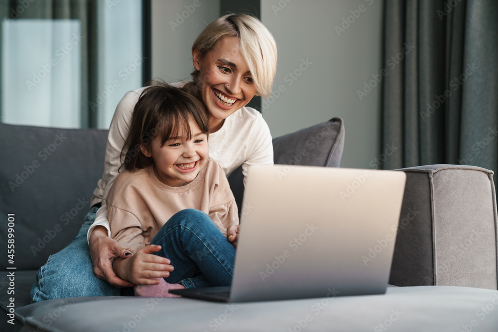 Happy young mother and her little daughter Happy young mother and her little daughter