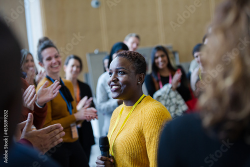 Female speaker talking to audience photo