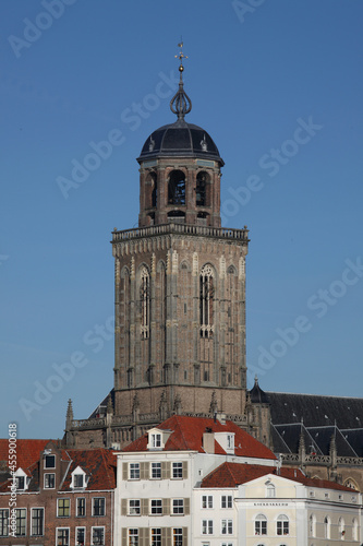 The tower of the Great Church and houses in the city of Deventer, the Netherlands