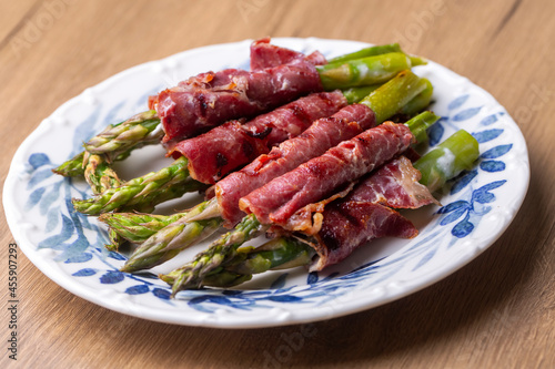 Grilled asparagus with bacon (Turkish name; Pastirmali kuskonmaz ızgara) photo