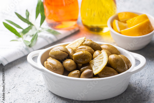 Cracked green olives. Crack...