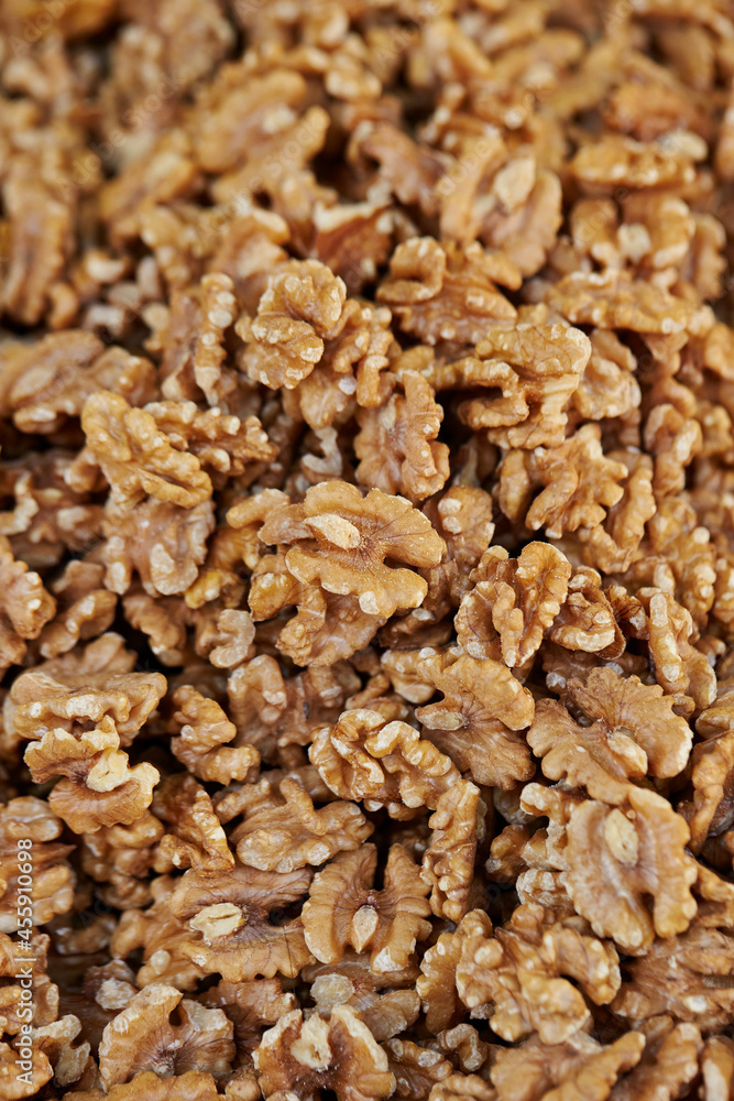 Raw walnuts displayed in a traditional market Raw walnuts displayed in a traditional market