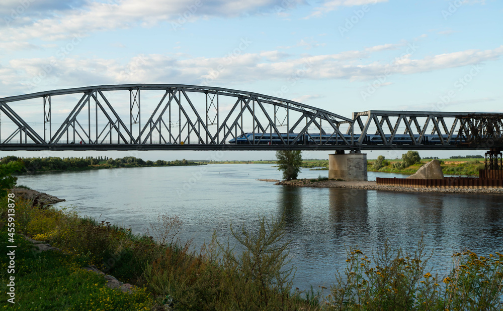 A train passing through the Vistula River in Tczew 