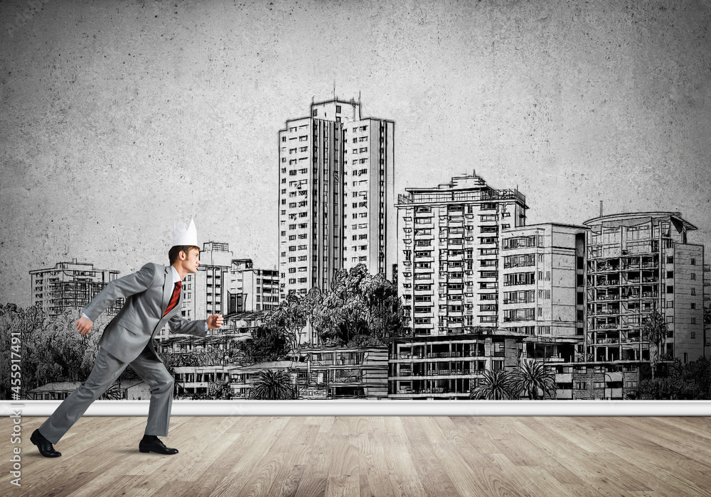 King businessman in elegant suit running and drawn cityscape silhouette at background King businessman in elegant suit running and drawn cityscape silhouette at background