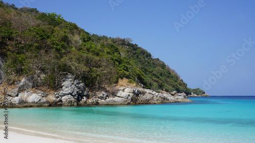 Beautiful blue sea and clear beach landscape of the sunny day with bright sky Racha Island