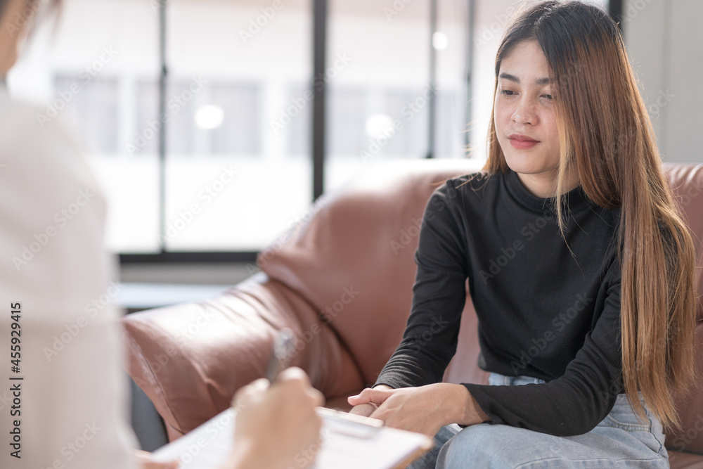 Young asian woman with mental health problem meet psychologist to consult and mental therapy. Psychology and mental therapy concept Young asian woman with mental health problem meet psychologist to consult and mental therapy. Psychology and mental therapy concept