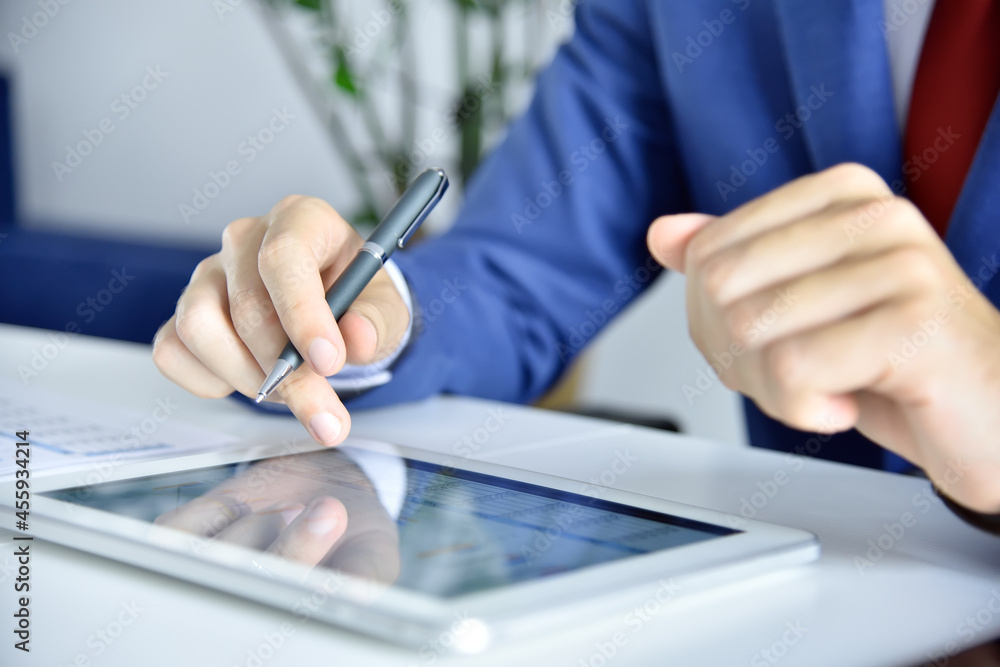 Accountant man checks business report Accountant man checks business report