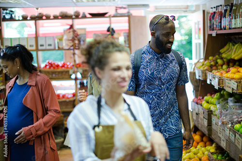 People shopping in grocery store © KOTO