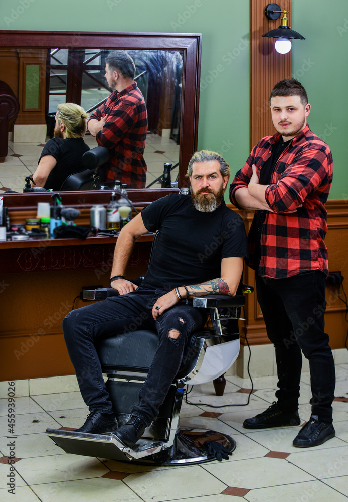 Fototapeta premium How may I help you. new stylish haircut. mature hipster with beard.