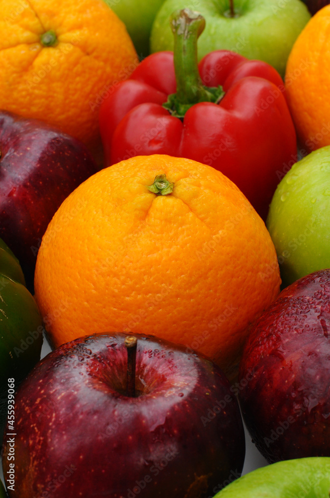 close up of fresh mixed fruits red apple and orange with green apple on background fruit health food 