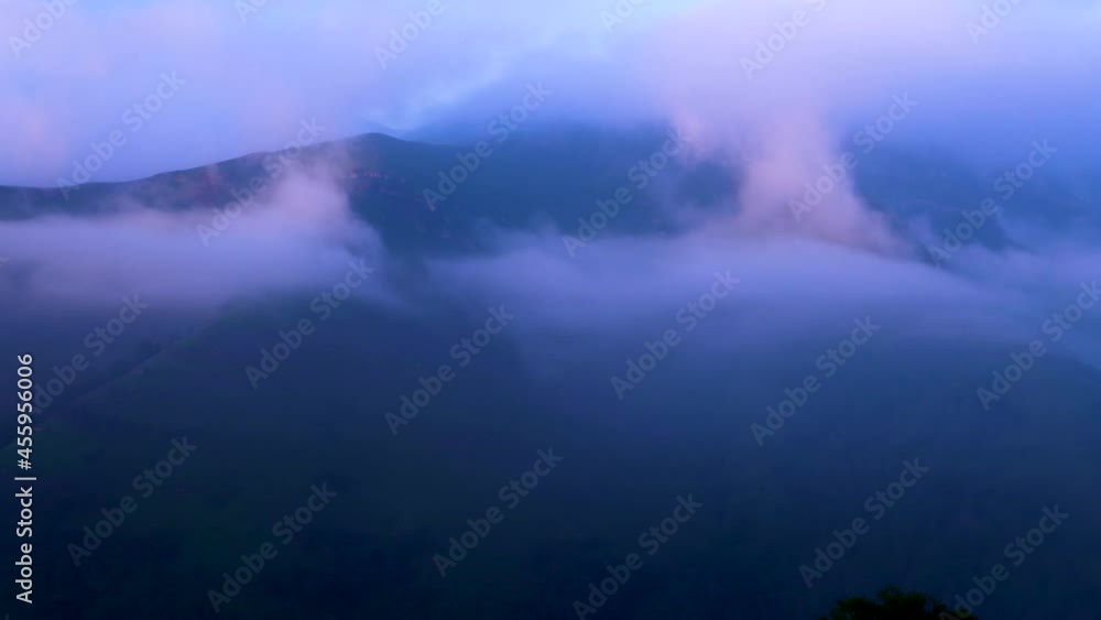 Landscape at sunset in the surroundings of Monte Castro Valnera and the source of the Pas River. Forests and fogs near Vega de Pas in the Valles Pasiegos. Cantabria, Spain, Europe Landscape at sunset in the surroundings of Monte Castro Valnera and the source of the Pas River. Forests and fogs near Vega de Pas in the Valles Pasiegos. Cantabria, Spain, Europe
