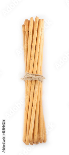 Delicious grissini sticks on white background, top view photo