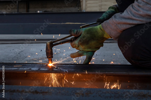 Cutting steel plate. Oxy-fuel welding (commonly called oxyacetylene welding, oxy welding, or gas welding in the United States) and oxy-fuel cutting are processes. photo