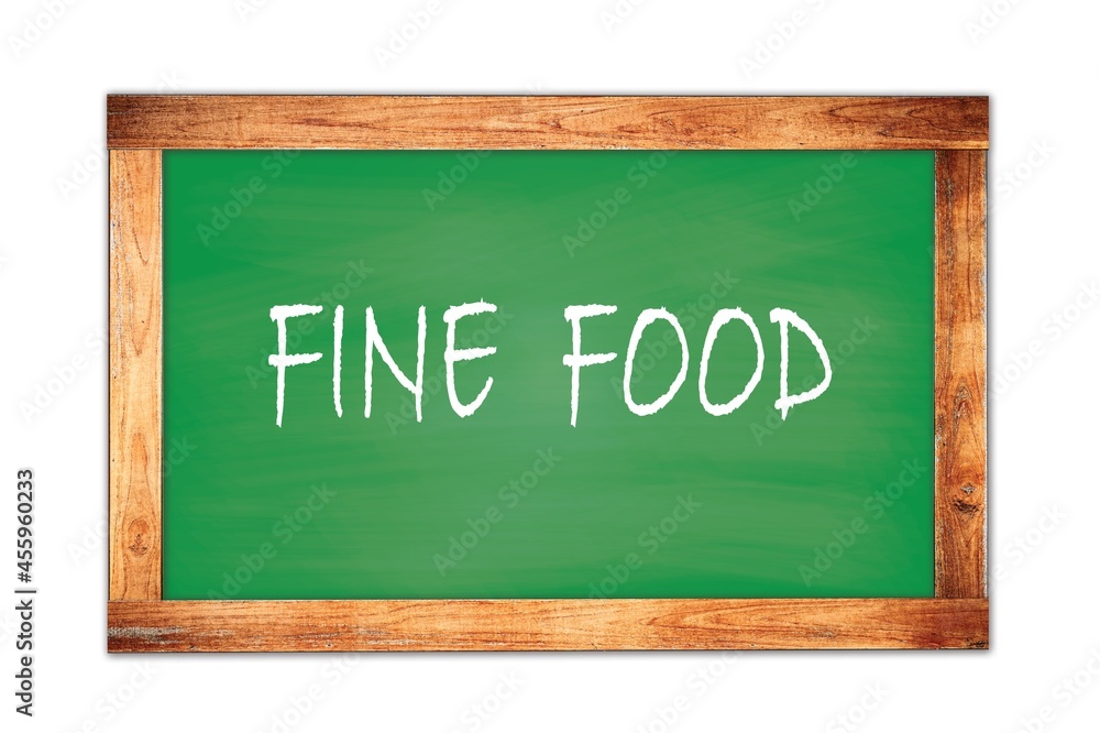 FINE FOOD text written on green school board. FINE FOOD text written on green school board.