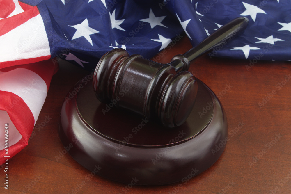 Wooden judge gavel with USA flag. 