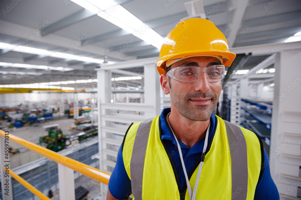 custom made wallpaper toronto digitalPortrait serious male worker in protective eyewear and hard-hat in factory