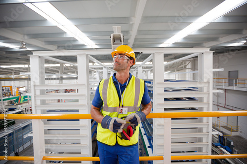 Portrait male worker with ear protectors in factory © KOTO