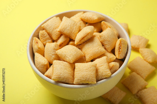 Corn pads with breakfast filling on a colored background close up