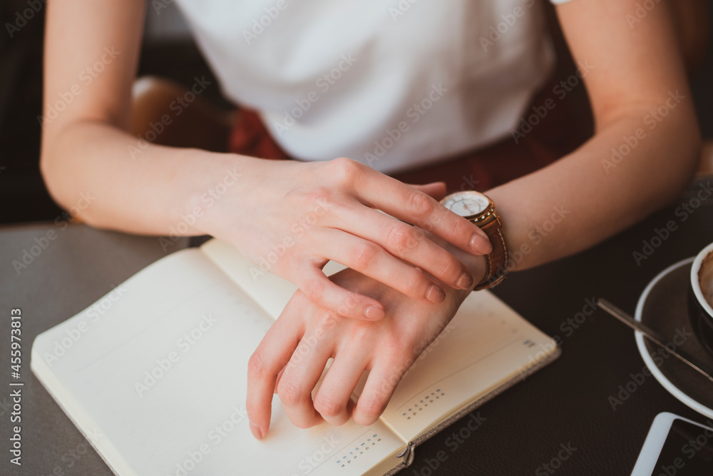 Close up of female hands with stylish watch Close up of female hands with stylish watch