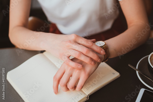 Close up of female hands with stylish watch
