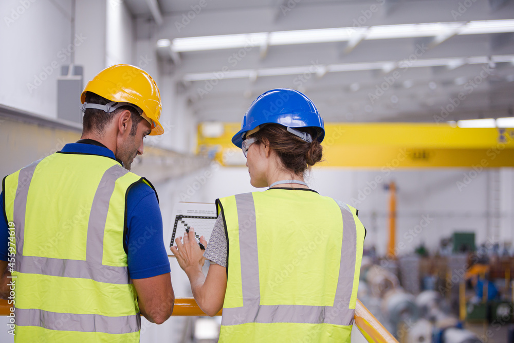 Supervisor and worker in factory Supervisor and worker in factory