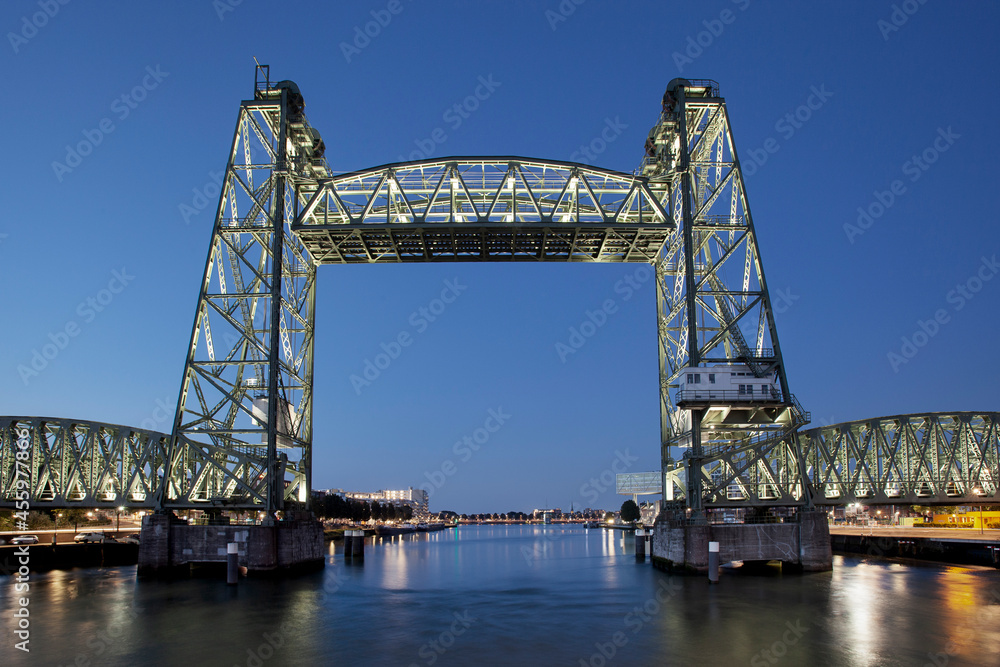 Famous old railroad bridge De Hef in the evening in Rotterdam